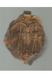 Mittelalterliches Siegel mit Resten von Pergamentbändern.