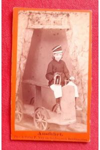 Originalfotografie eines jugendlichen Bergmannes mit Lampe betitelt Ausfahrt