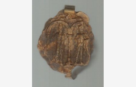 Mittelalterliches Siegel mit Resten von Pergamentbändern.