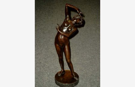 Bronzefigur: Nackte Tänzerin.